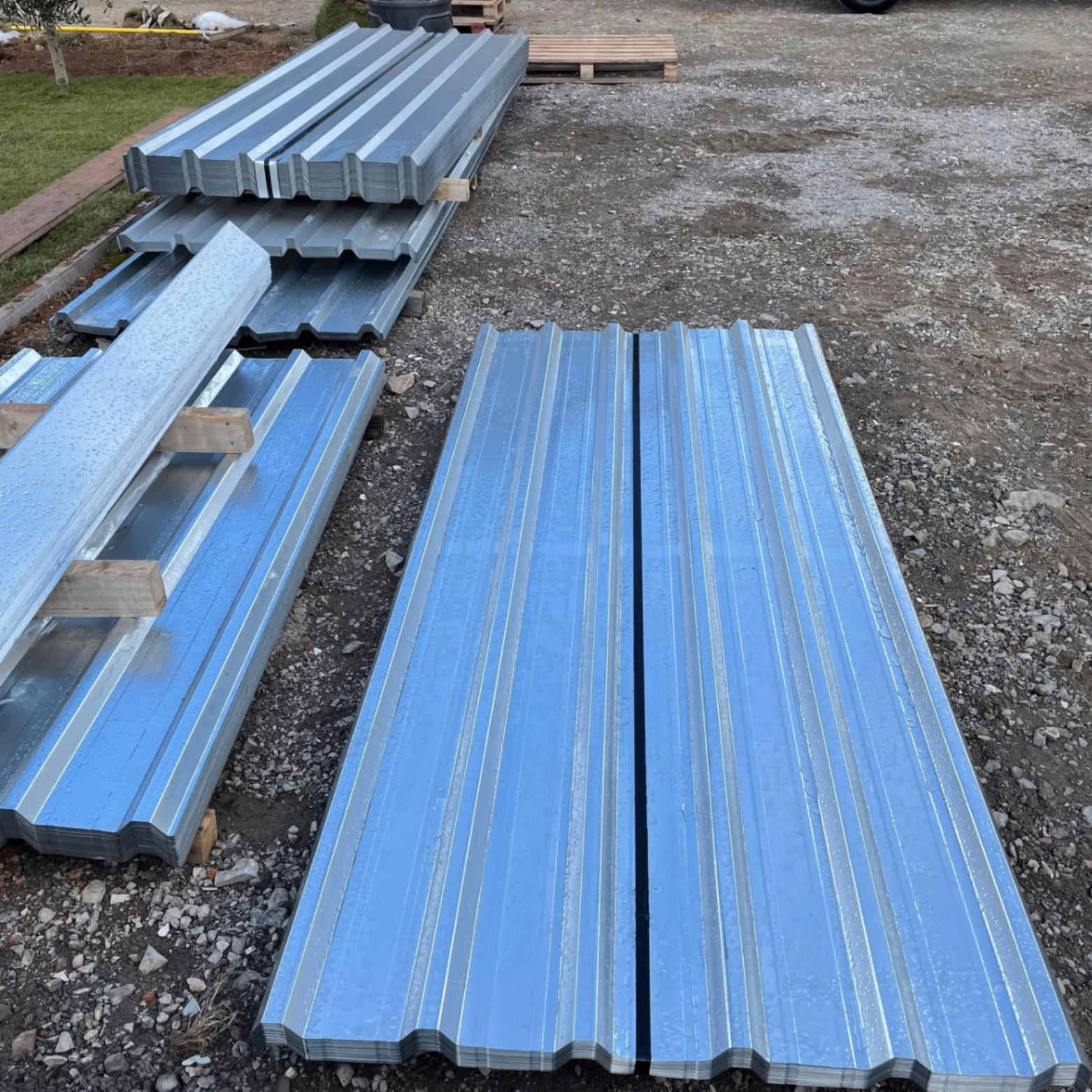 Galvanised box profile 32/1000 roofing sheets stacked outdoors